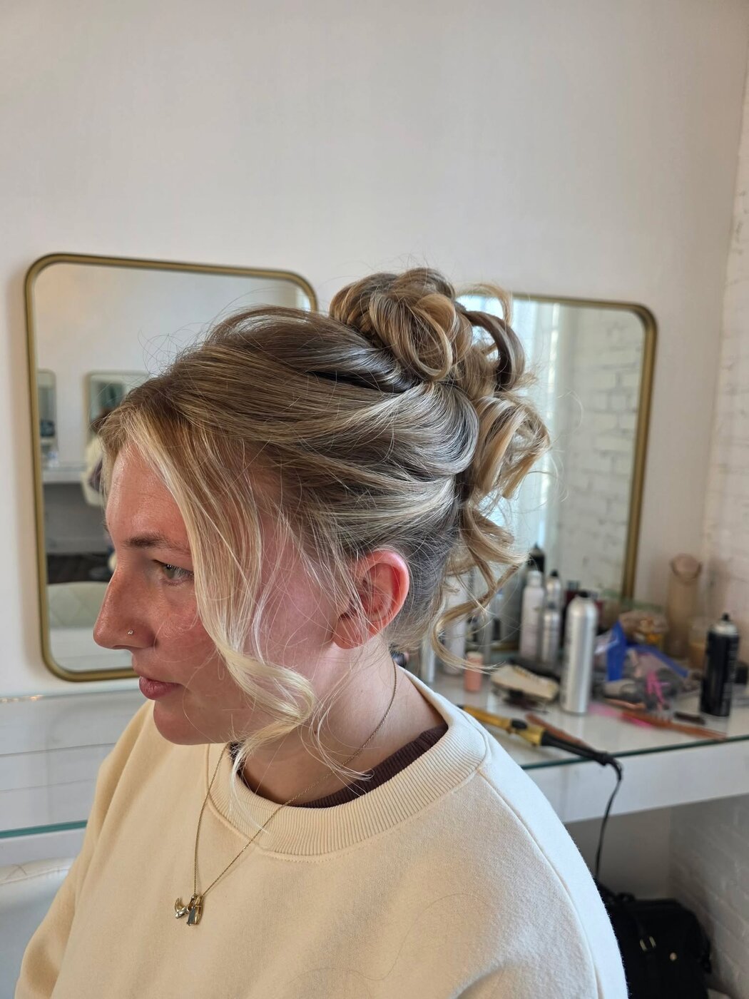 A happy client showing off her style