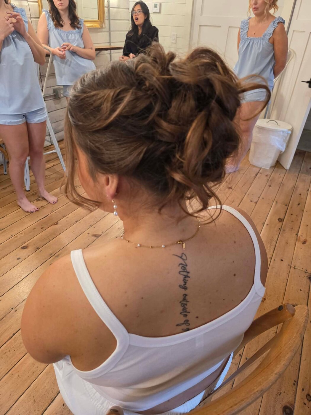 Elegant bridal updo with soft romantic curls