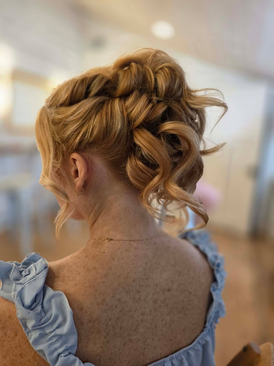 Textured curled updo pinned to perfection
