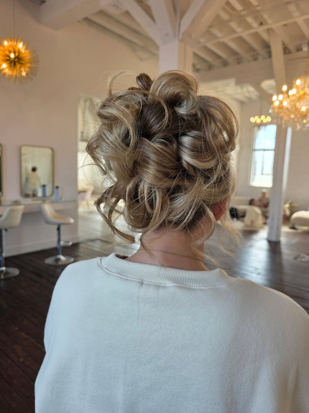 Bride with a romantic curled updo