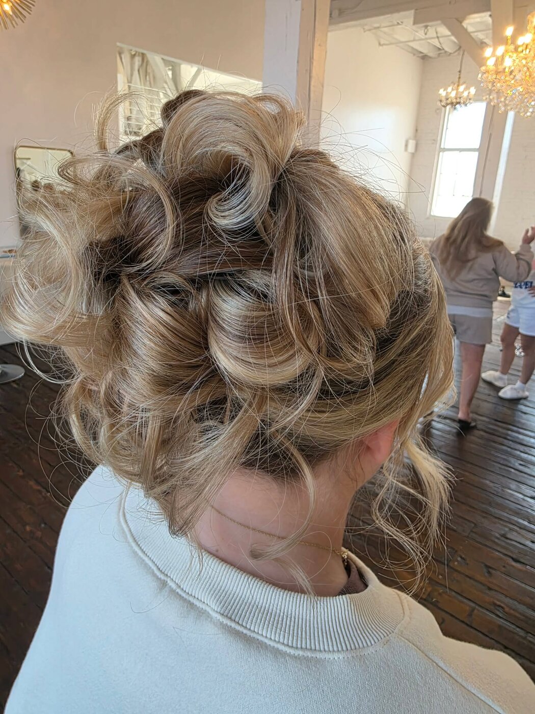 Voluminous curly updo for the big day