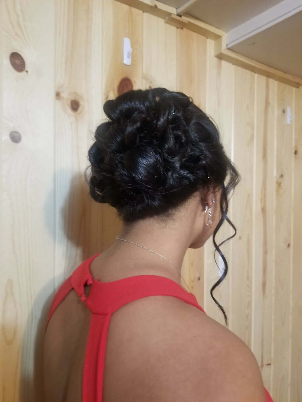 Classic bridal updo with face-framing detail