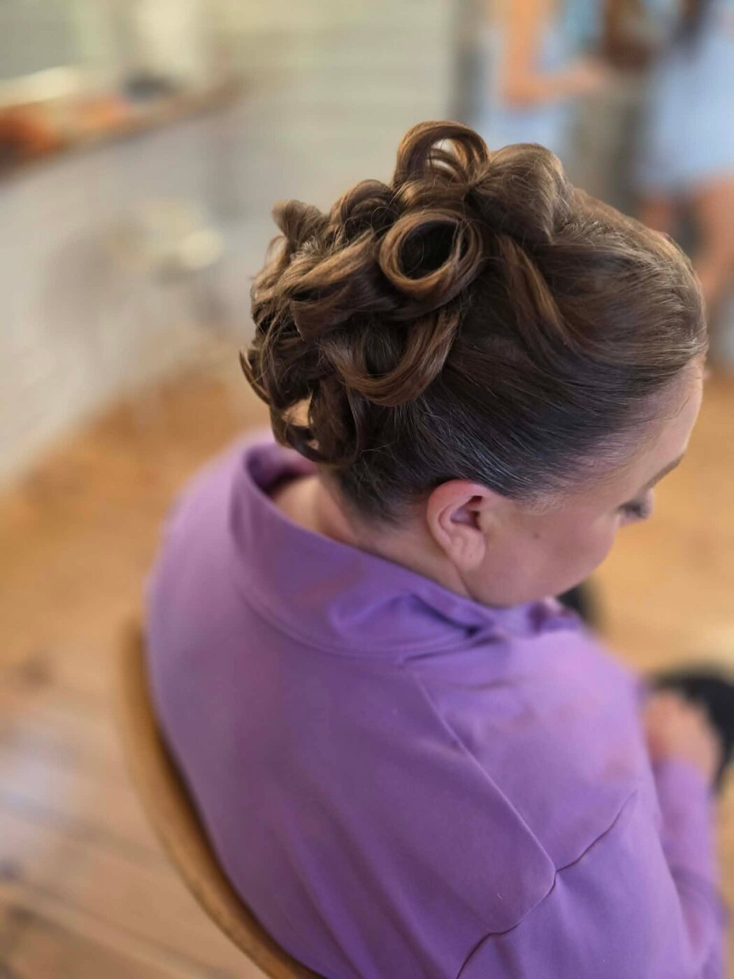 Voluminous curly updo for the big day