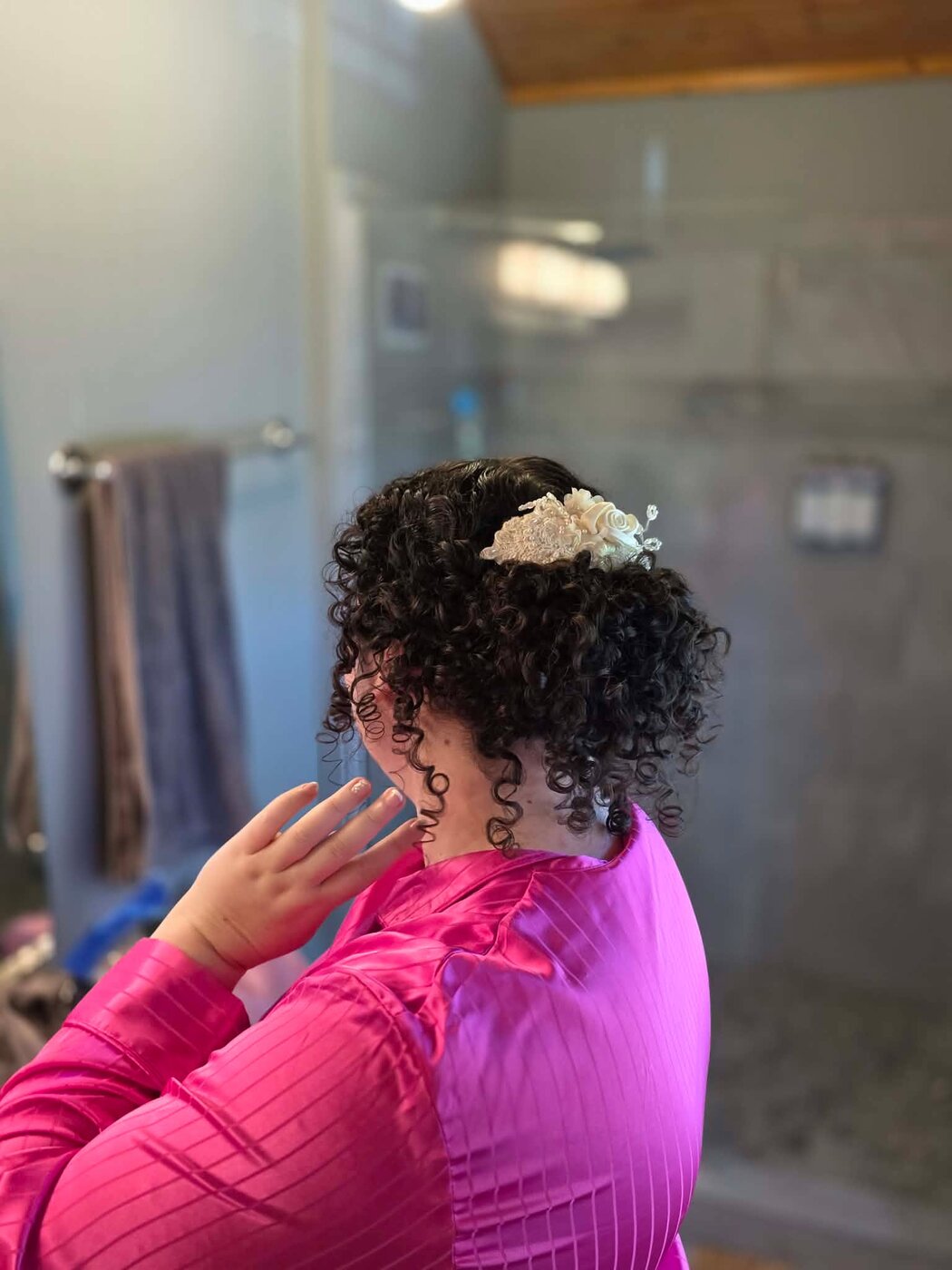 Voluminous curly updo for the big day