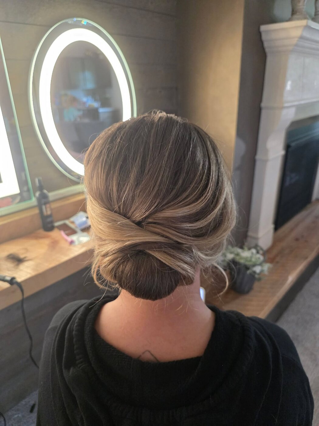 Elegant bridal updo with soft romantic curls