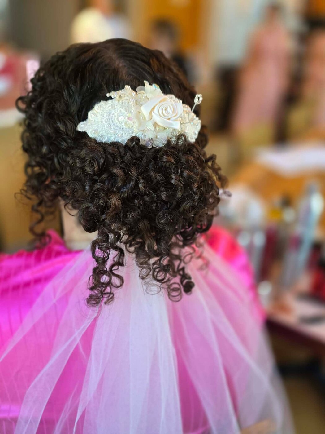 Textured curled updo pinned to perfection